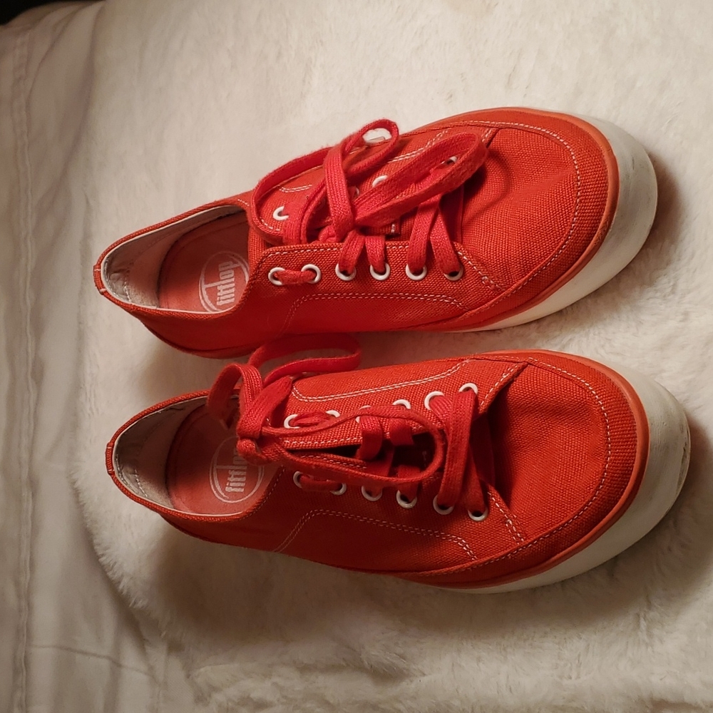 A PAIR OF RED FITFLOP SNEAKERS SIZE 8 .